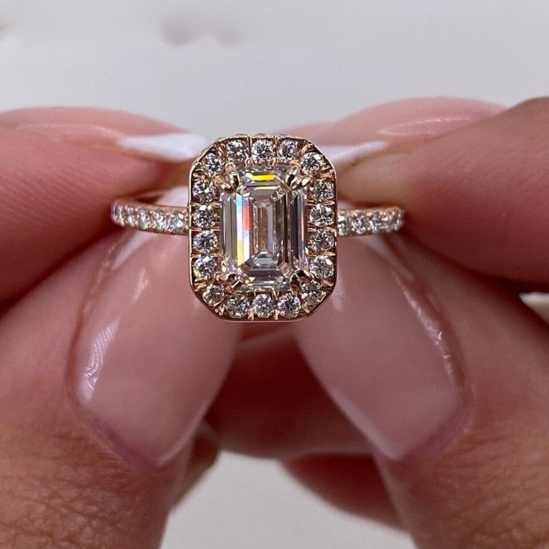 Emerald halo diamond ring