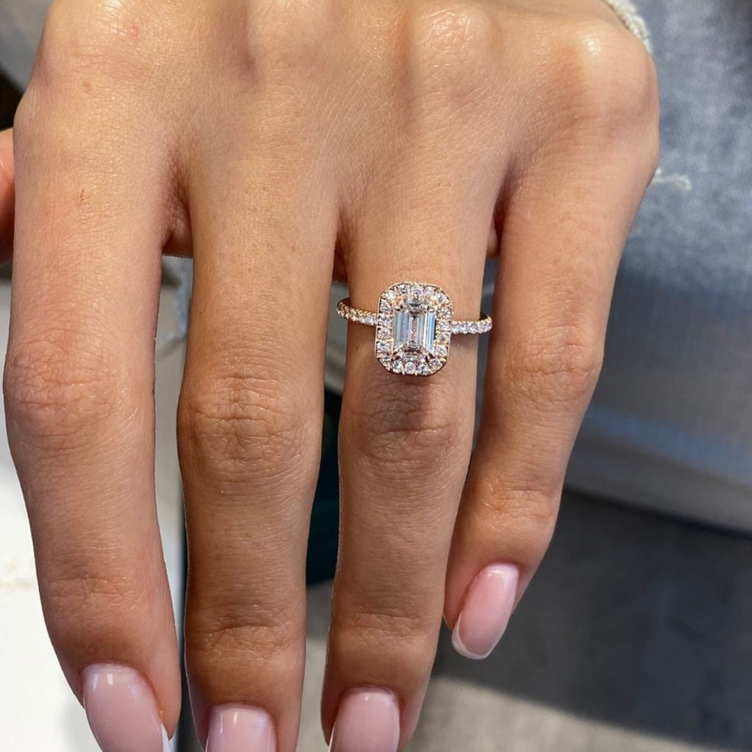 Diamond halo emerald ring