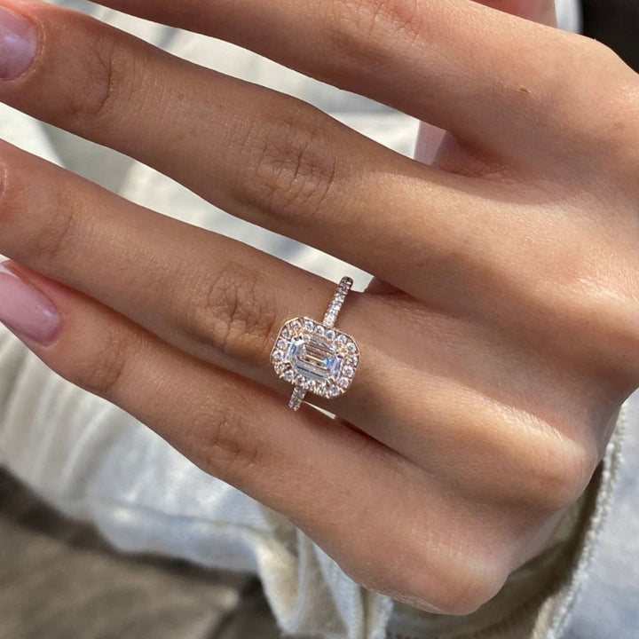 Vintage emerald halo diamond ring