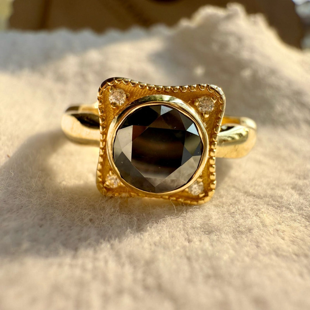 Black round diamond ring