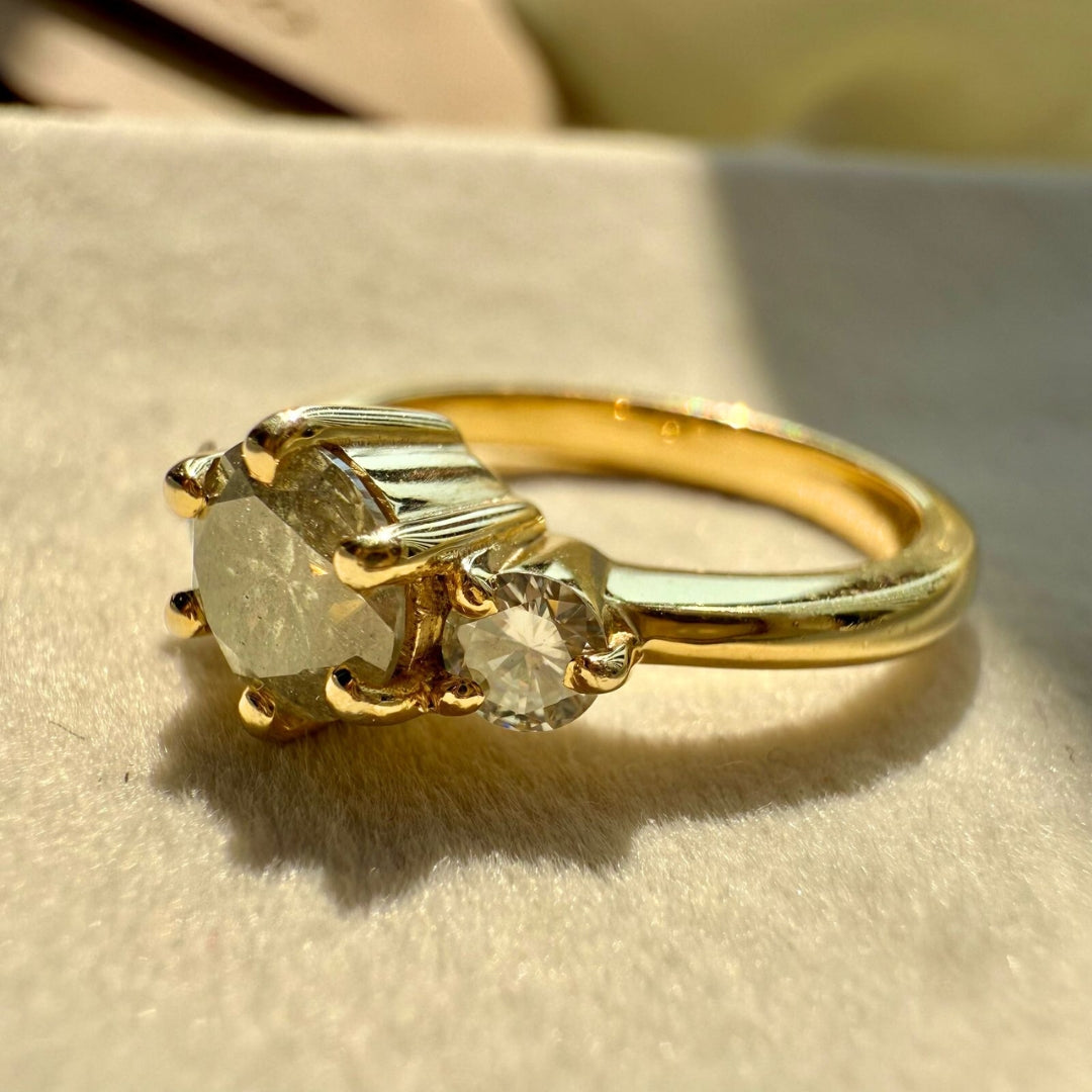 Round three stone ring