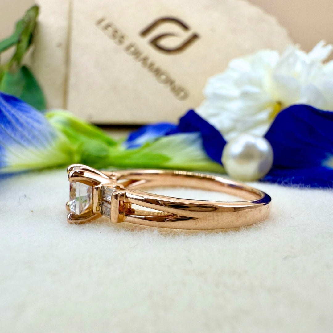 Round and baguette three-stone ring