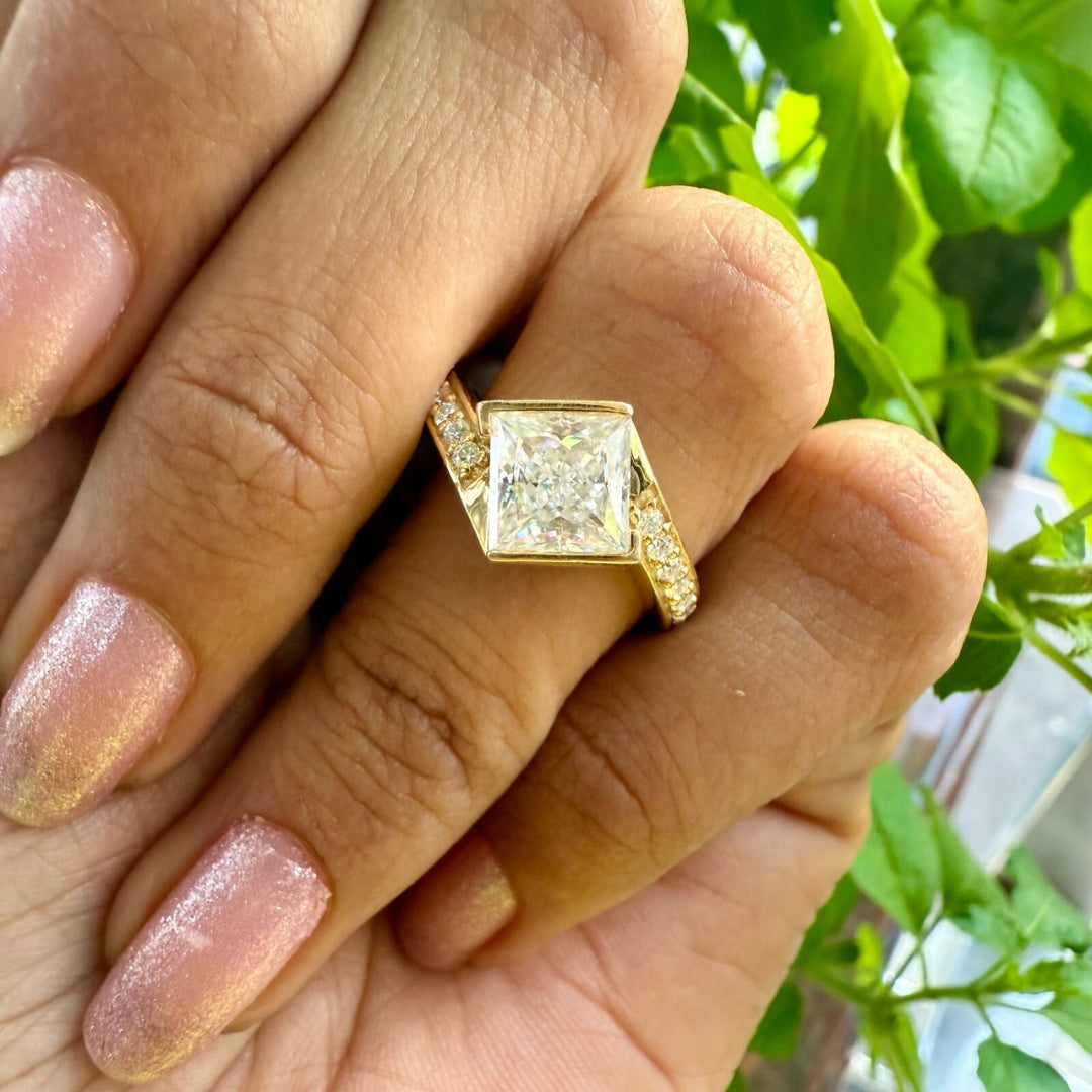 Princess yellow gold  with round side diamond ring