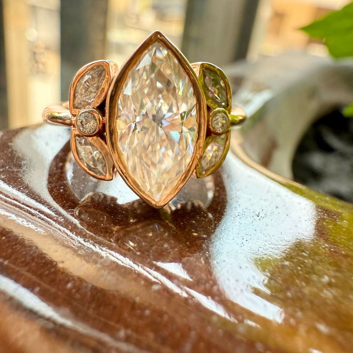 Marquise and round diamond ring