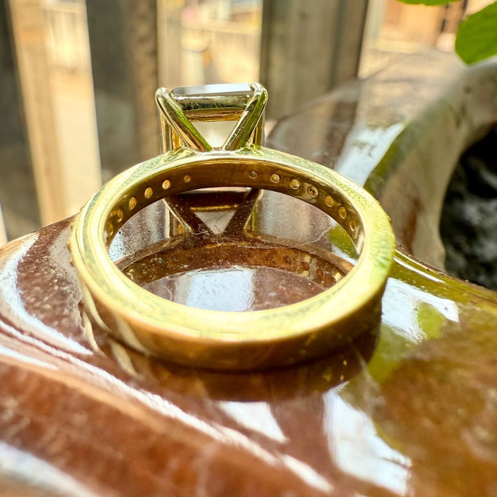 Asscher cut diamond with semi eternity ring