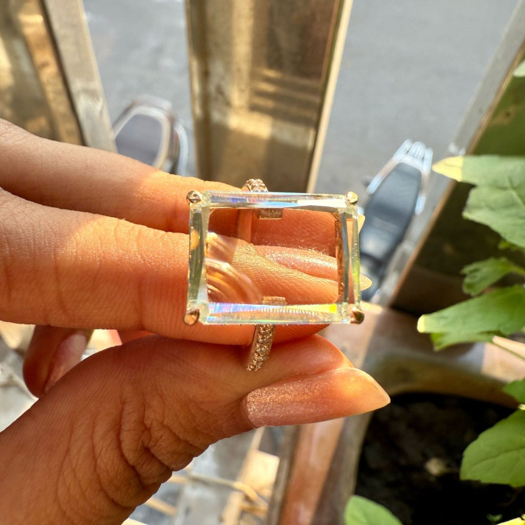 Emerald diamond half eternity ring