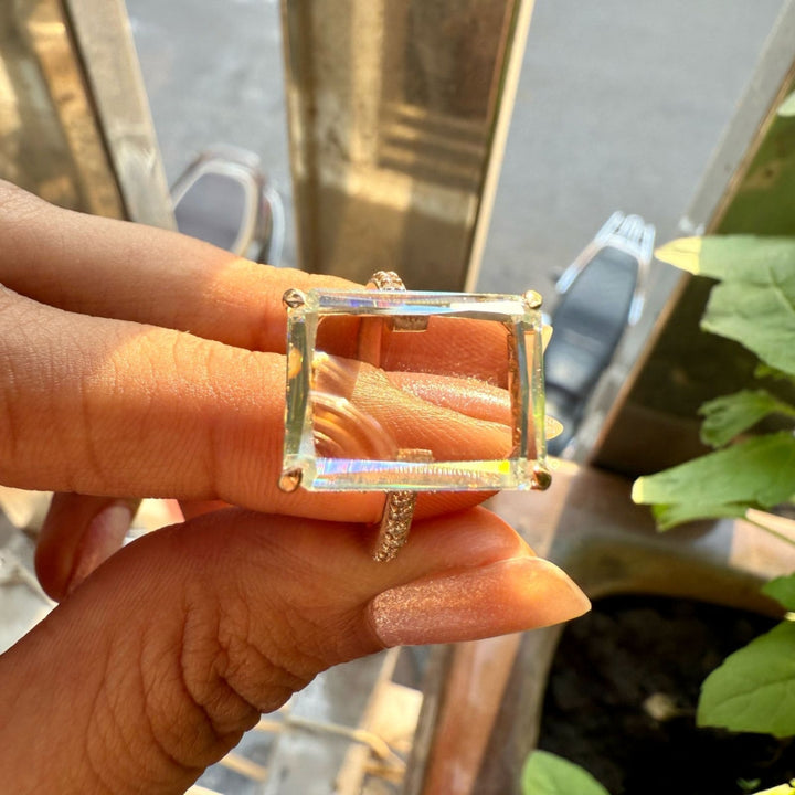 Emerald diamond half eternity ring