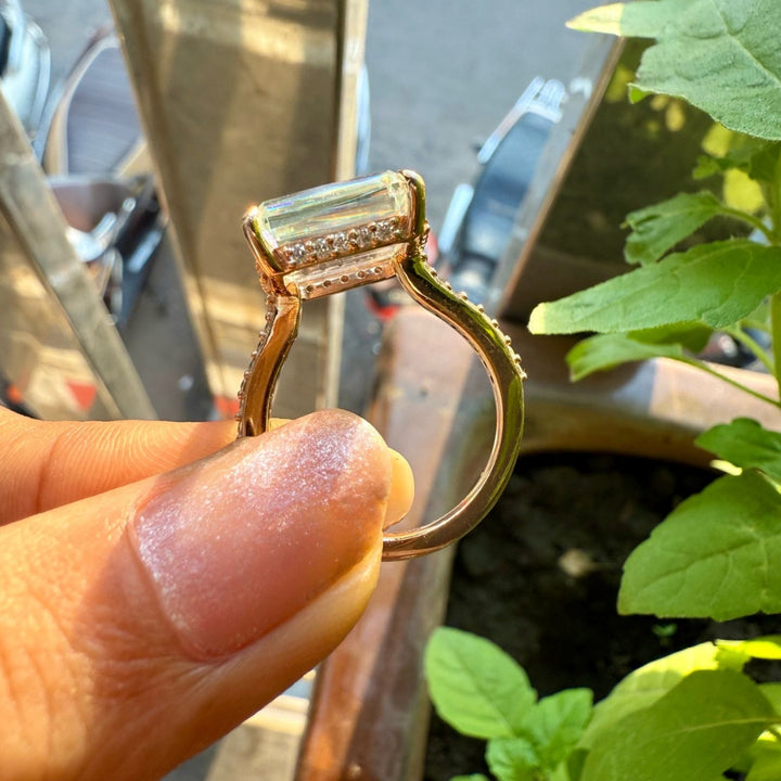 Emerald hidden diamond ring