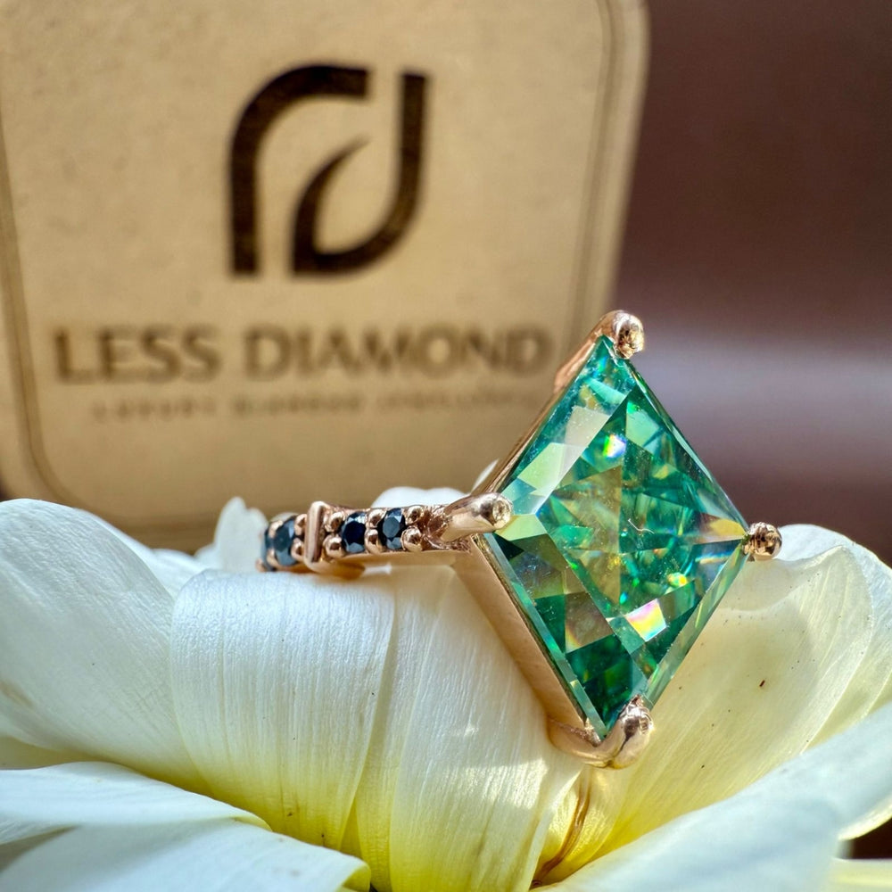 Kite cut green diamond ring