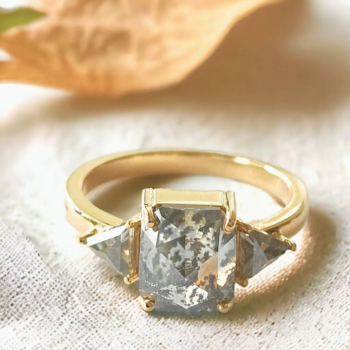 Radiant cut diamond ring triangle side stone ring