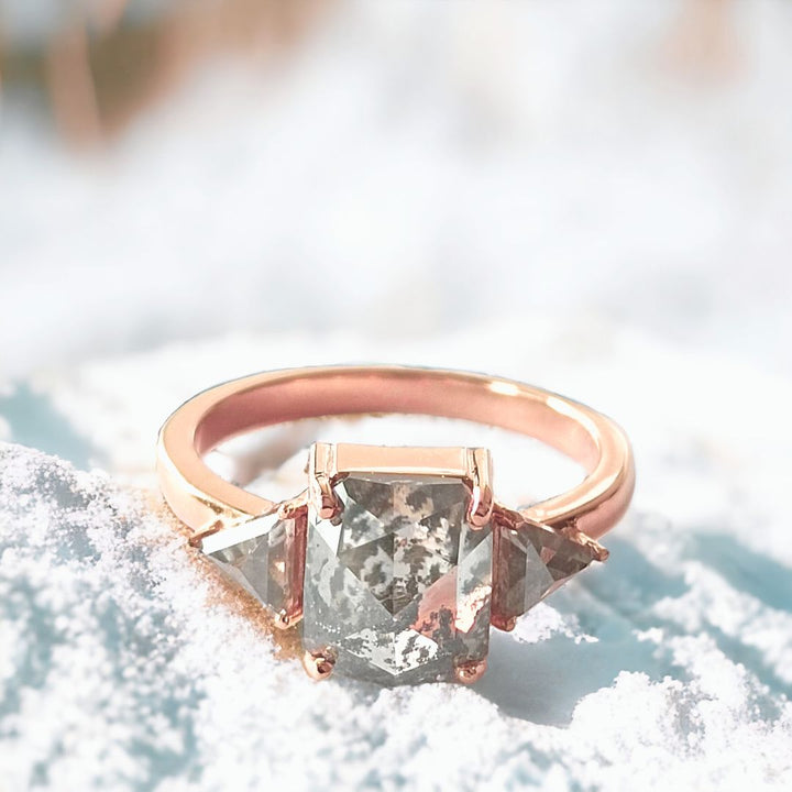 Cushion ring with triangle side stones