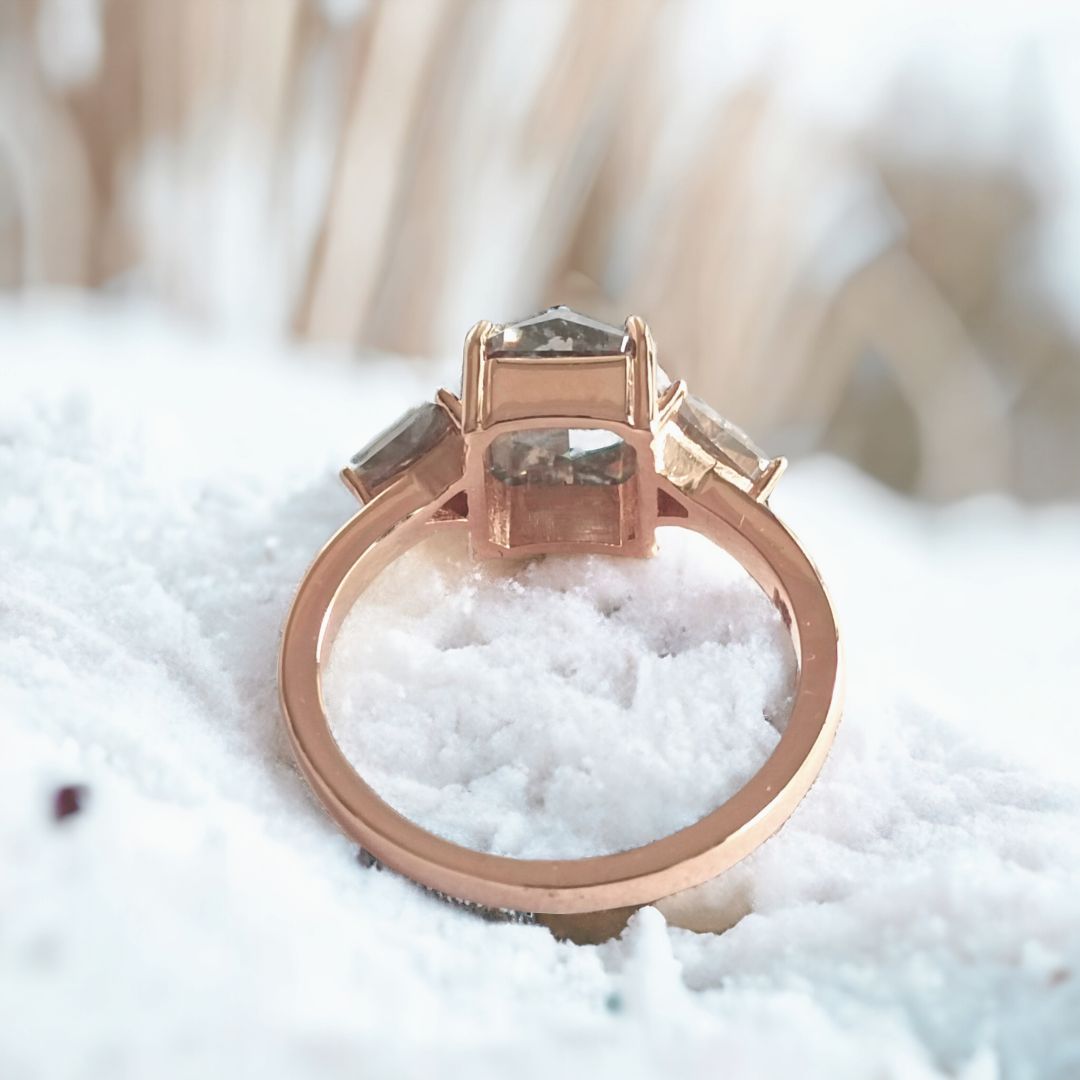 Three stone cushion engagement ring