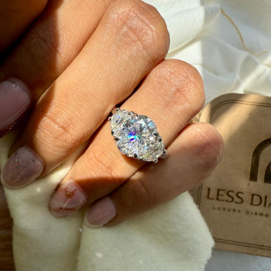 Diamond ring with half moon side stones