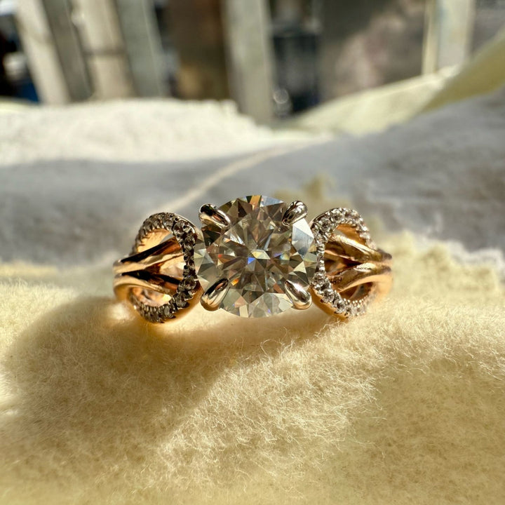 Round cut moissanite engagement ring