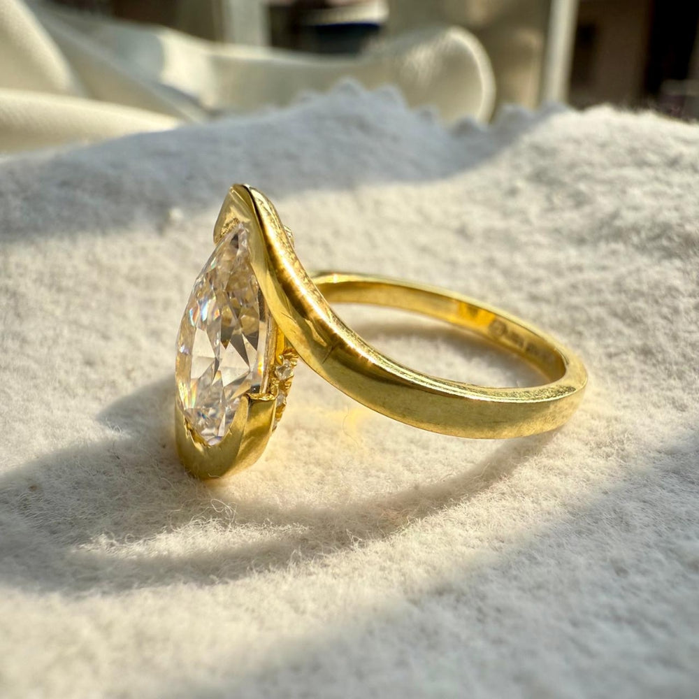 Pear cut gold ring