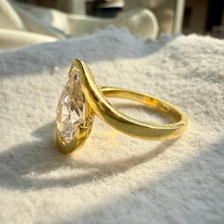 Pear cut gold ring